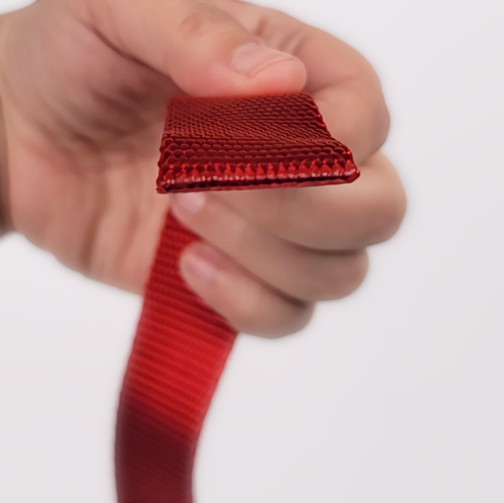 A roll unraveled of Black Heavy Nylon Webbing