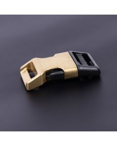 1 Inch Gold Plated Metal / Black Plastic Hybrid Side Release Buckle with a dark background