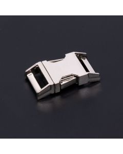 3/4 Inch Metal side release buckle on a black background 