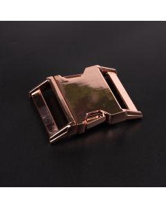 1 1/2 Inch Contoured Rose Gold Side Release Buckle shown on a dark background