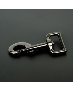 A gunmetal swivel snap hook on a black background