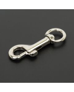A silver nickle plated snap hook on a black background