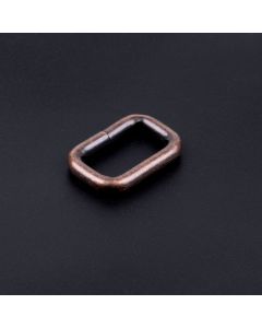 3/4 Inch Antique Copper Heavy Welded Rectangle Ring shown on a dark background