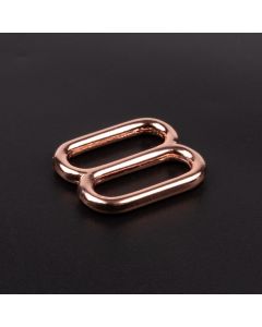 3/4 Inch Rose Gold Metal Round Wide-Mouth Triglide Slide shown on a dark background
