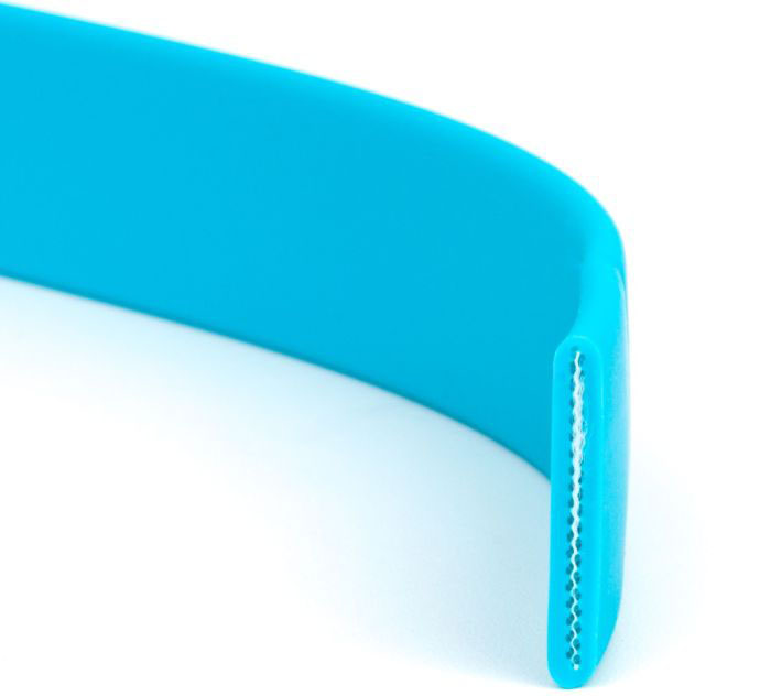 Blue coated PVC strap bisected to show protective coating and PVC strap inside.